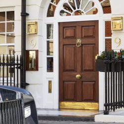 The facade of elegant Georgian townhouse 9 Hertford Street, Mayfair.